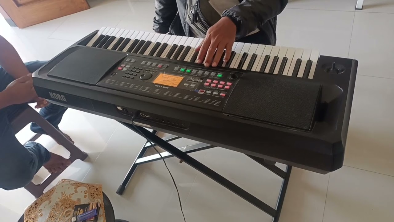 Perbedaan Korg EK - 50 dan Korg Pa 50 SD