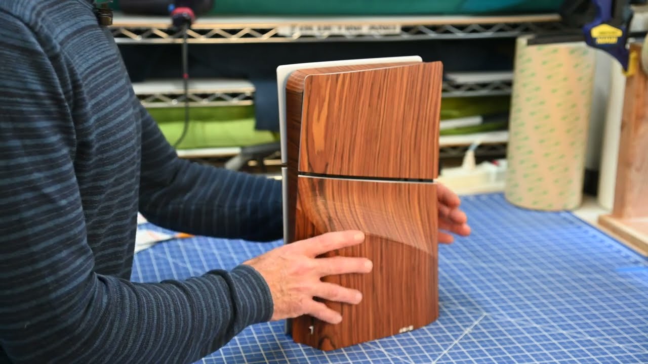 Installing a Toast wood cover on a PlayStation 5 Slim
