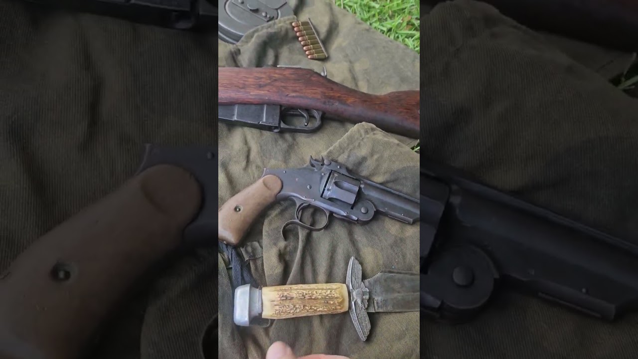 WW2 Russian rifle, pistol, trench knife, and spare ammo for brothers and sisters.