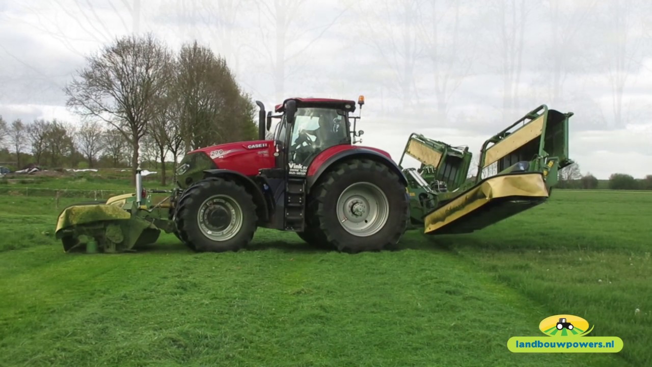Loonbedrijf Vink aan het gras maaien met de Optum 270