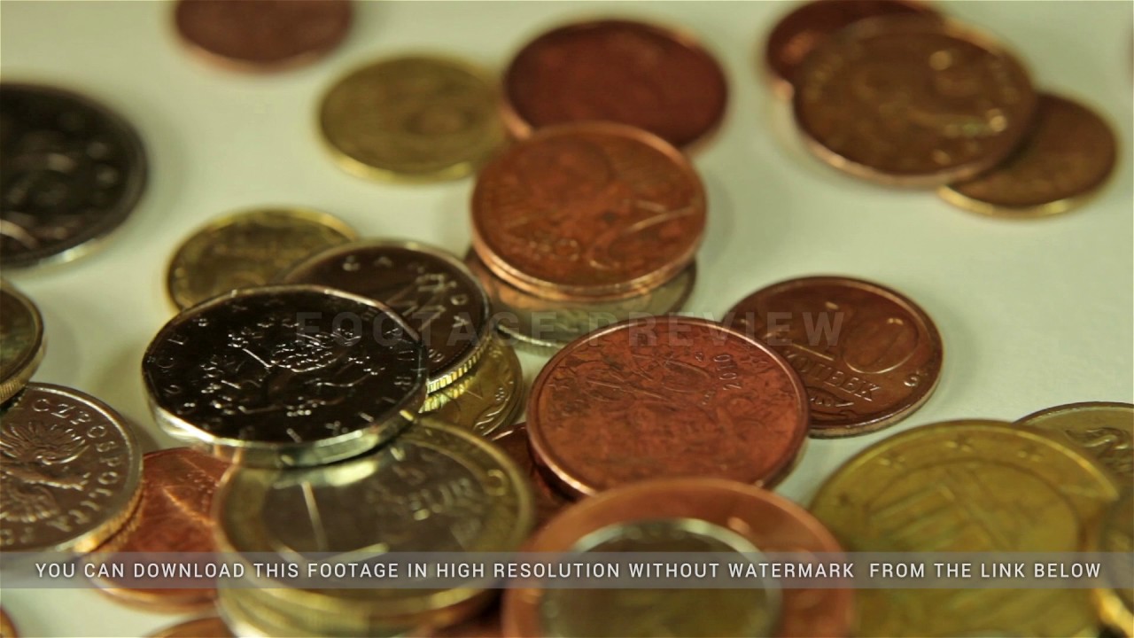 Coins dropping on the table
