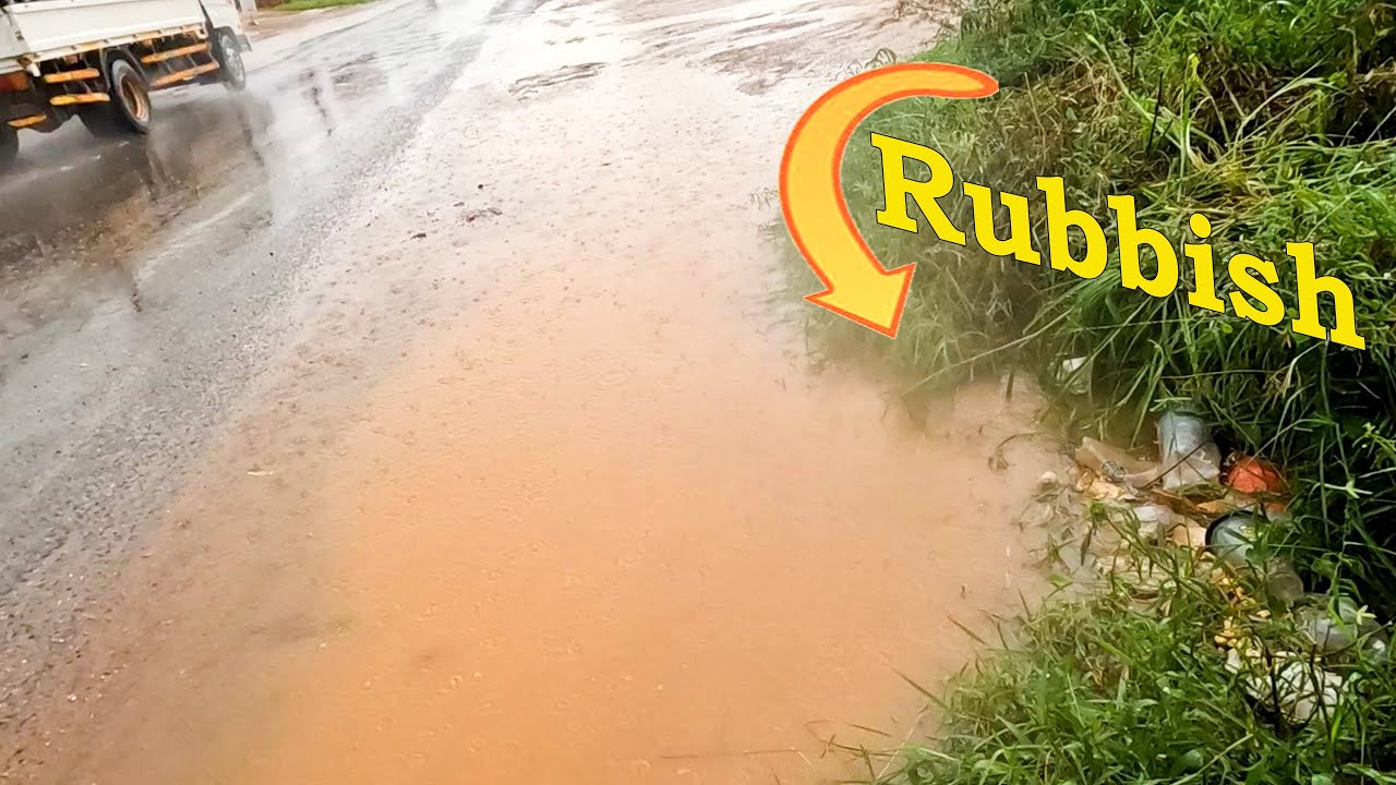 The Best Man Unclogging Drain On Street During Rubbish Stuck On Street