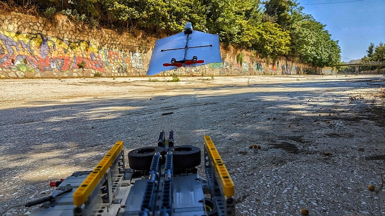 I built and tested a LEGO Technic paper plane catapult!