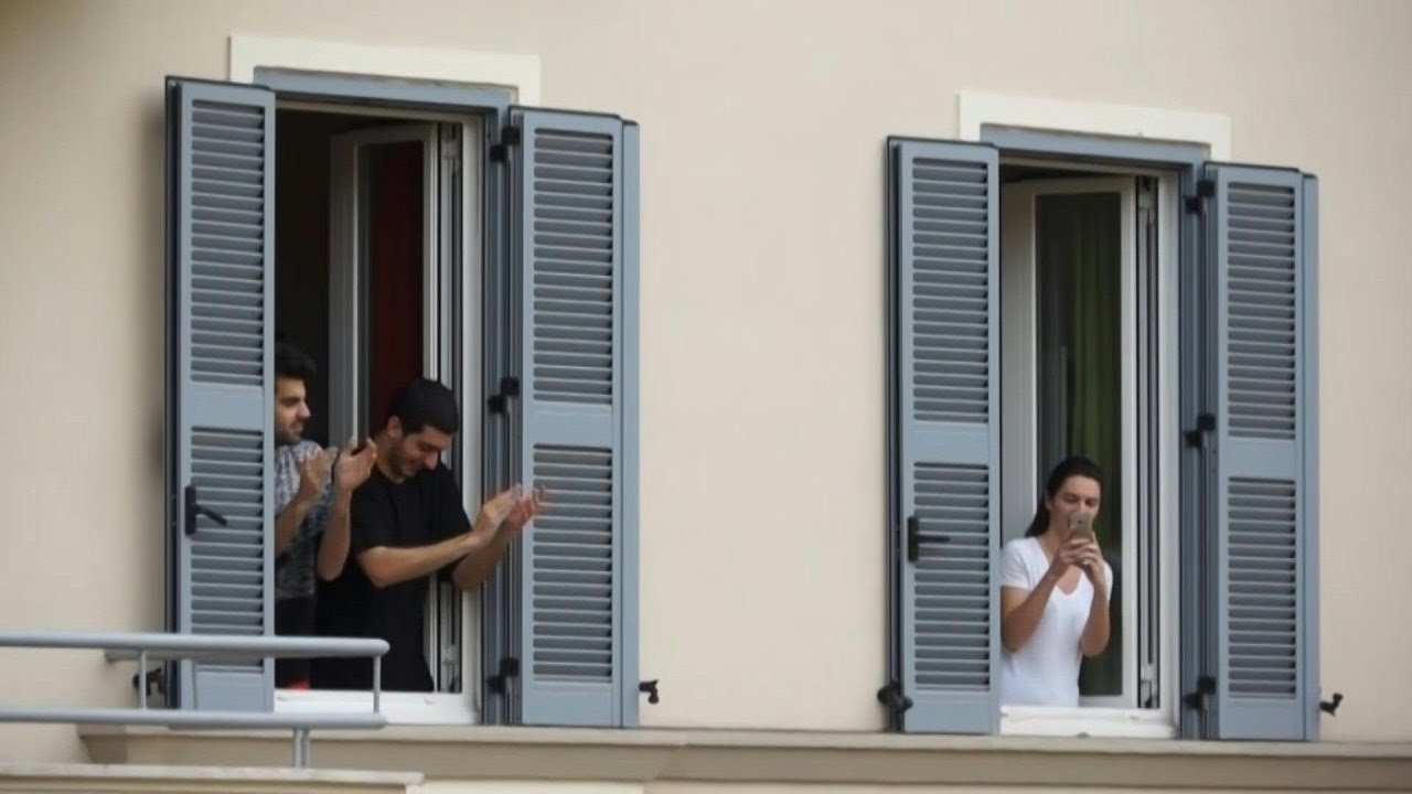 Europeans clap to thank medical staff battling coronavirus outbreak | AFP