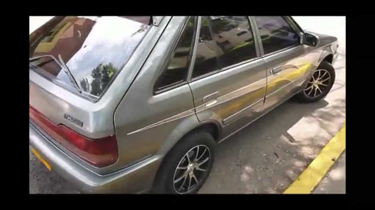Mazda 323 HS Gris