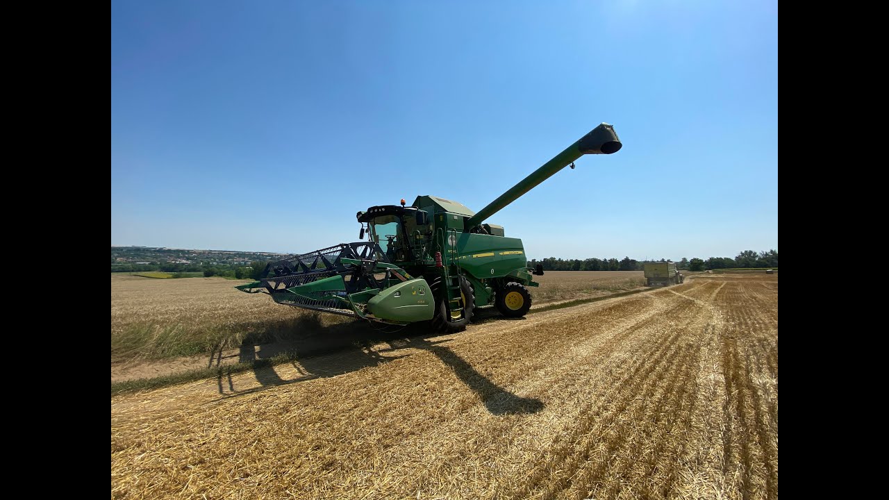 John Deere: W540 (6,8l.) First time in a Combine - short