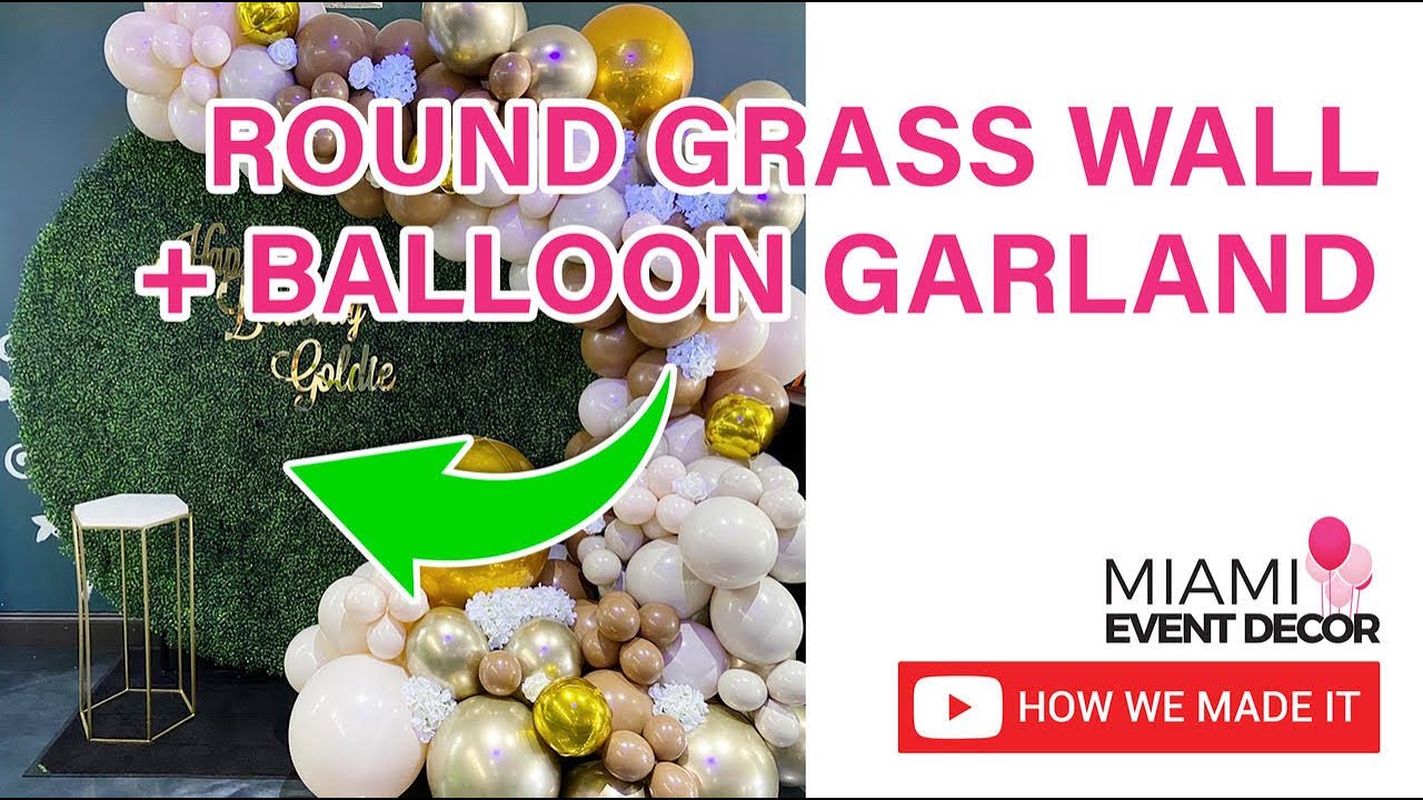 Круглая стена из зеленой травы с гирляндой из воздушных шаров