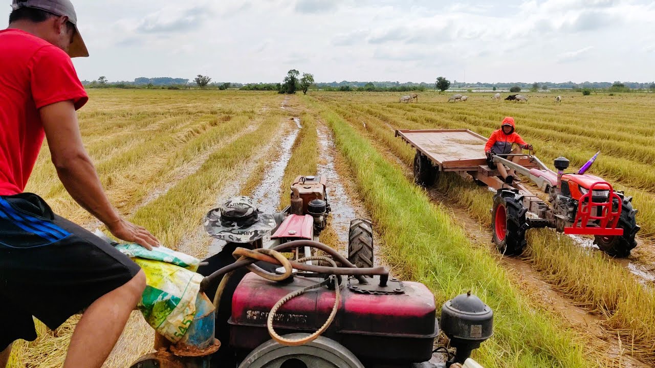 Essential Tool Transport: Mini Tractor Moves Water Pump During Flood Threat, Video in 4K