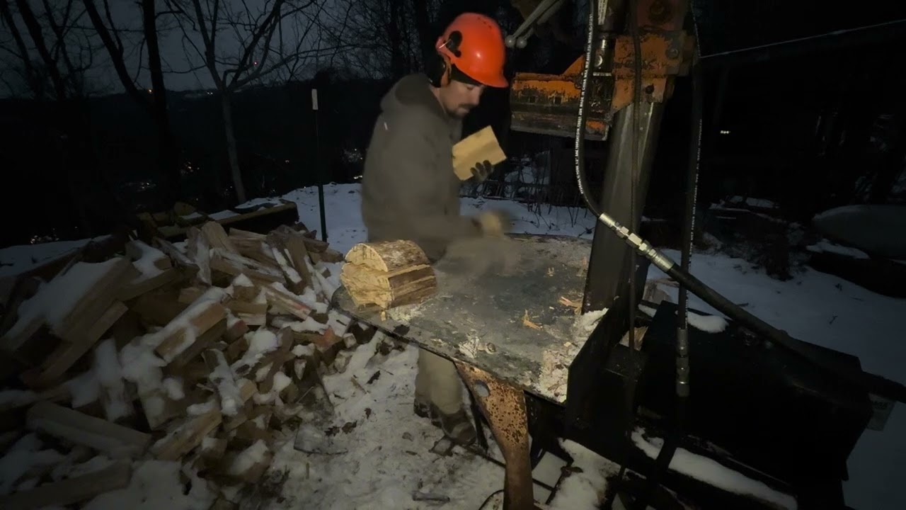 Homemade Vertical wood splitter 100 plus splits a minute- making kindling! 