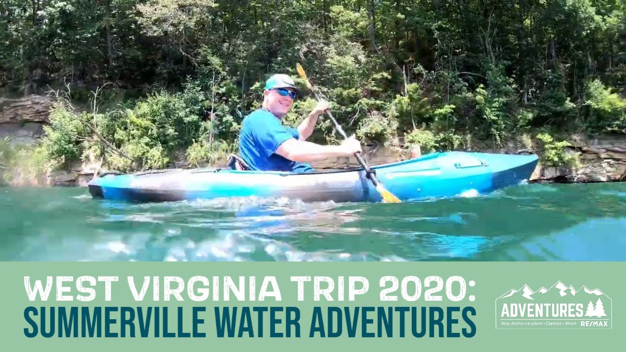 Kayaking and Cliff Jumping in Summersville Lake Pirate's Cove, West Virginia