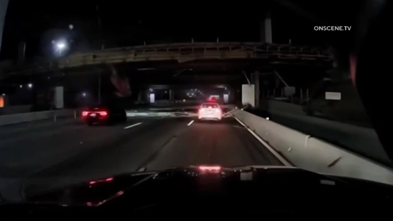 Dashcam video shows moment semi hits freeway overpass and other drivers slam into fallen beam