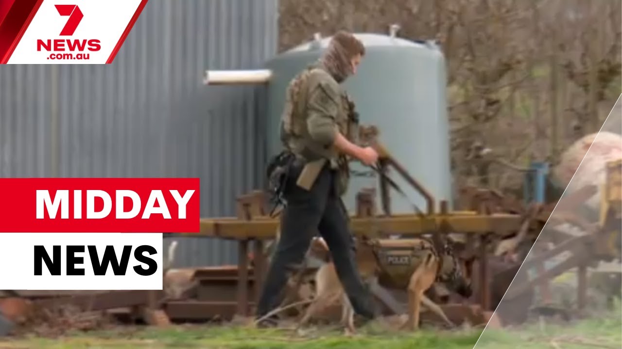 Manhunt for police shooter, Bus rollover tragedy, Qantas' jumbo profit | 7NEWS