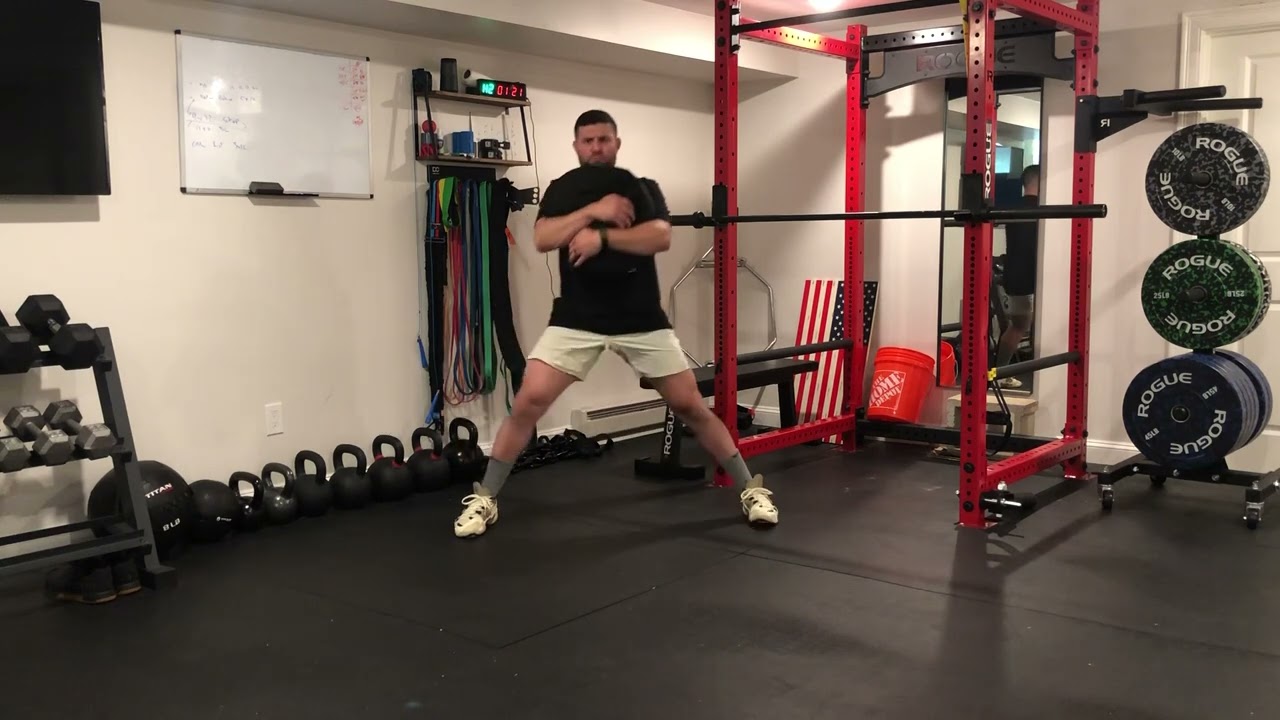 Matthew Ibrahim | Sandbag Hug Cossack Squat