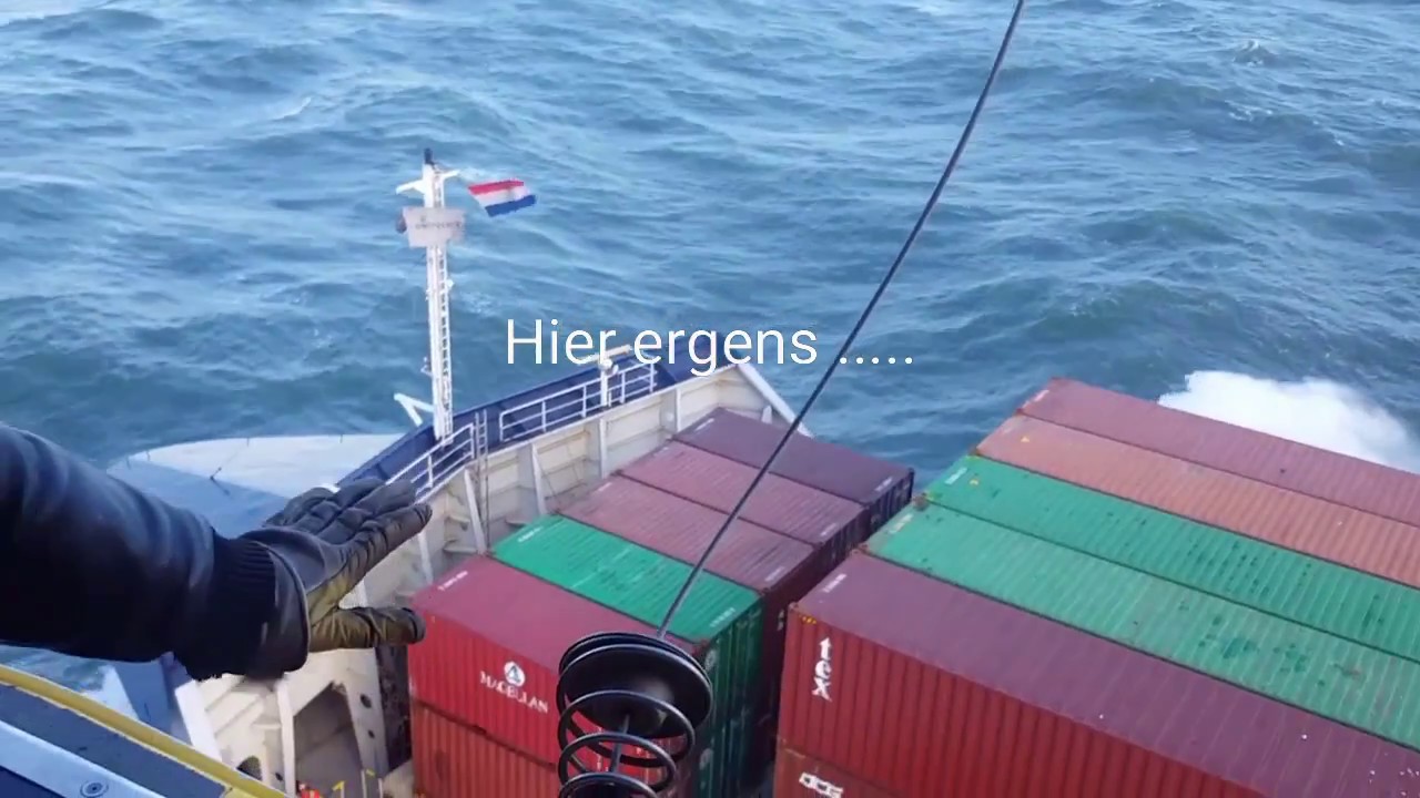 Pilot Helicopter operations Rotterdam Port. Disembarking pilot by helicopter