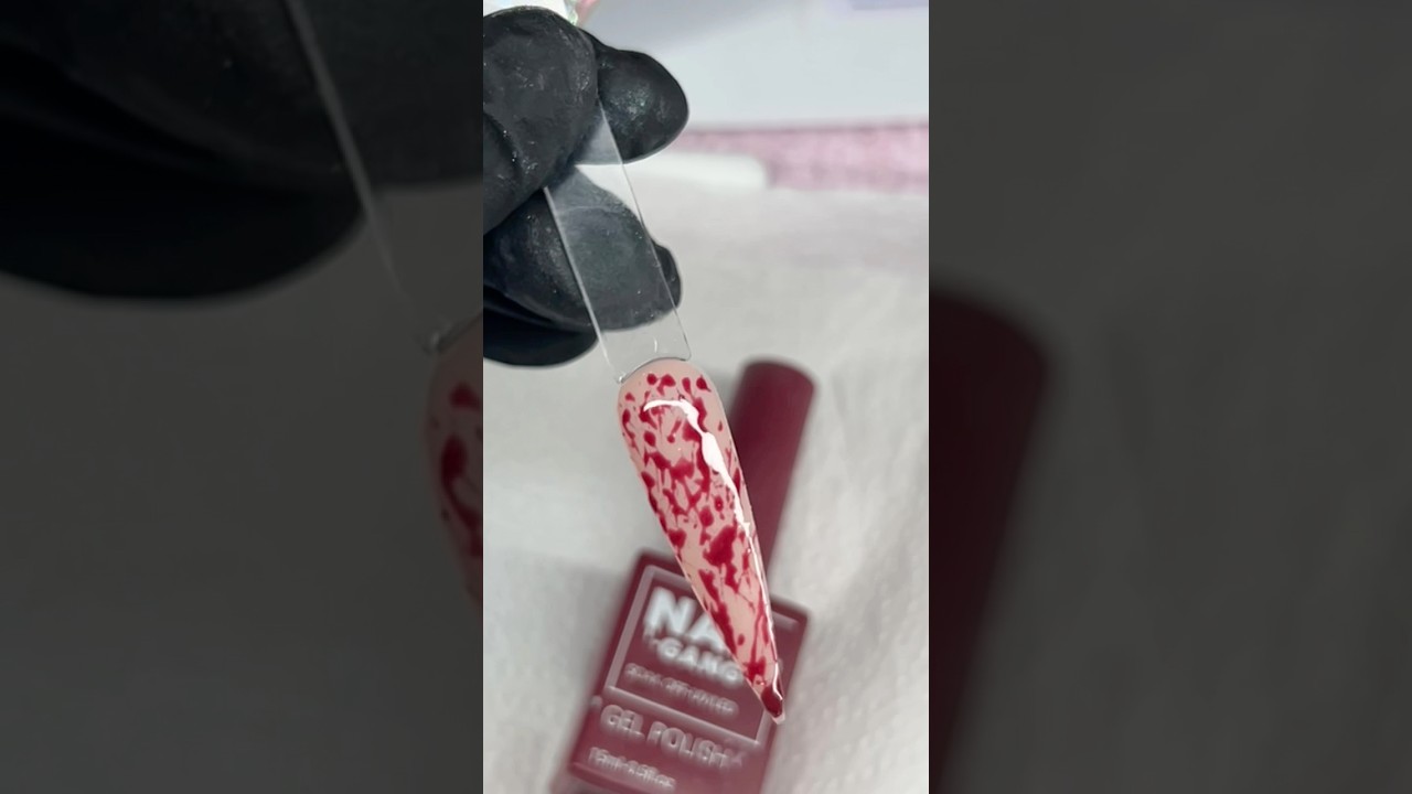 Day 4 Of Nailtober “Blood splatter nail” 