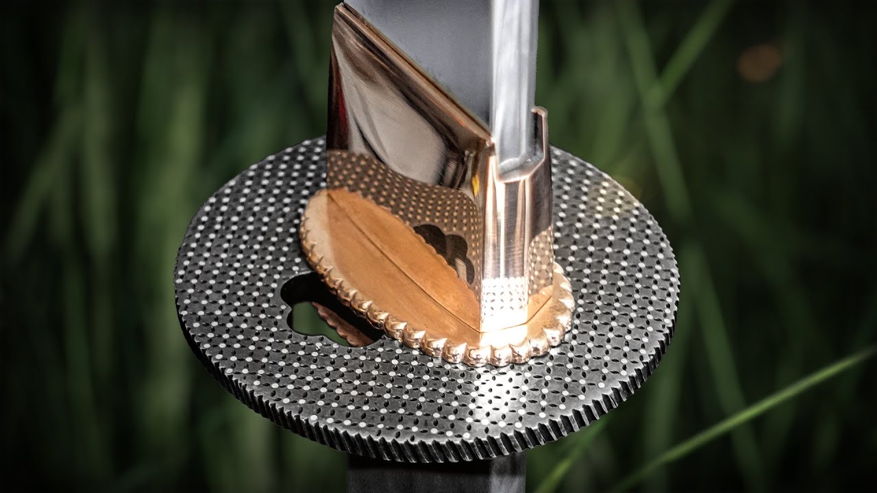 Tsuba: Crafted from Steel, Detailed with Silver Inlay