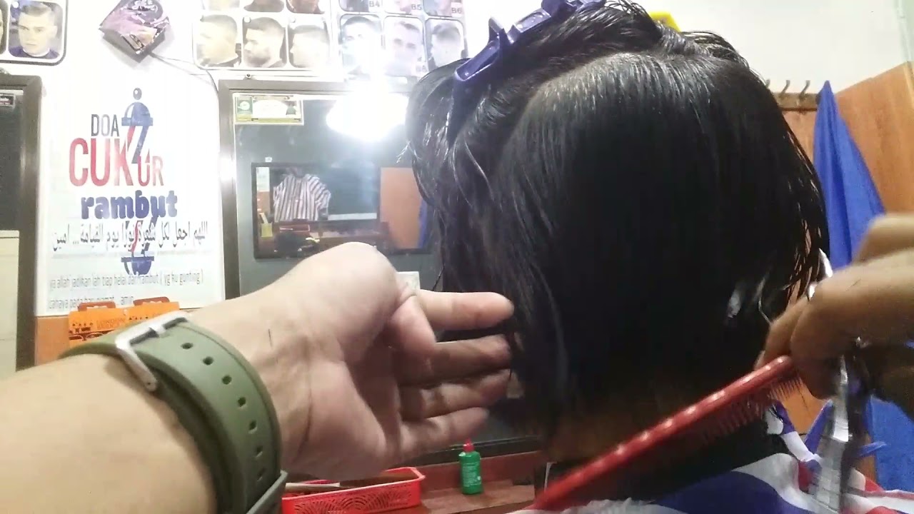 POTONG RAMBUT WANITA DI TRAP