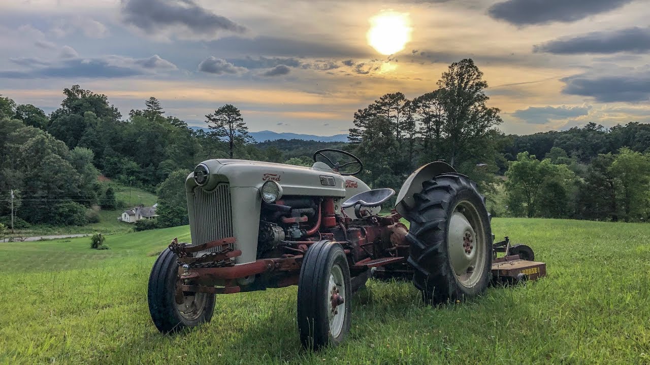 Ford 600 Tractor Mowing a Field