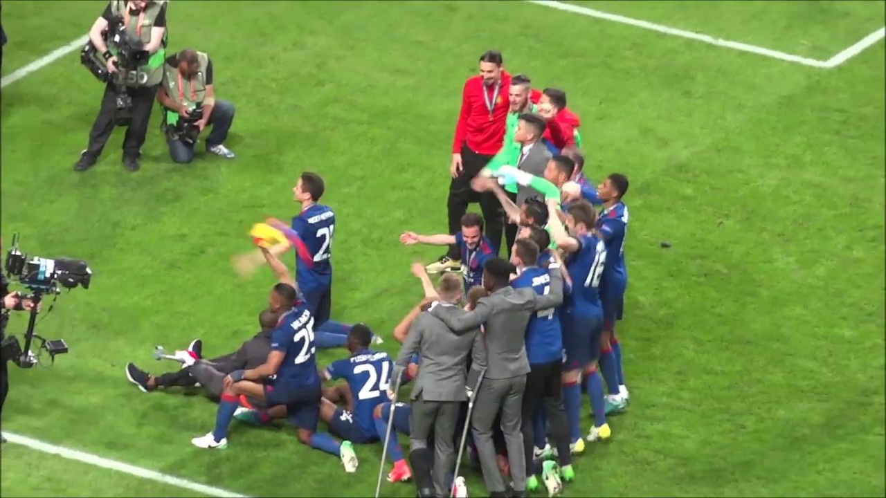 2017 UEFA Europa League Final: Manchester United players celebrate trophy with fans
