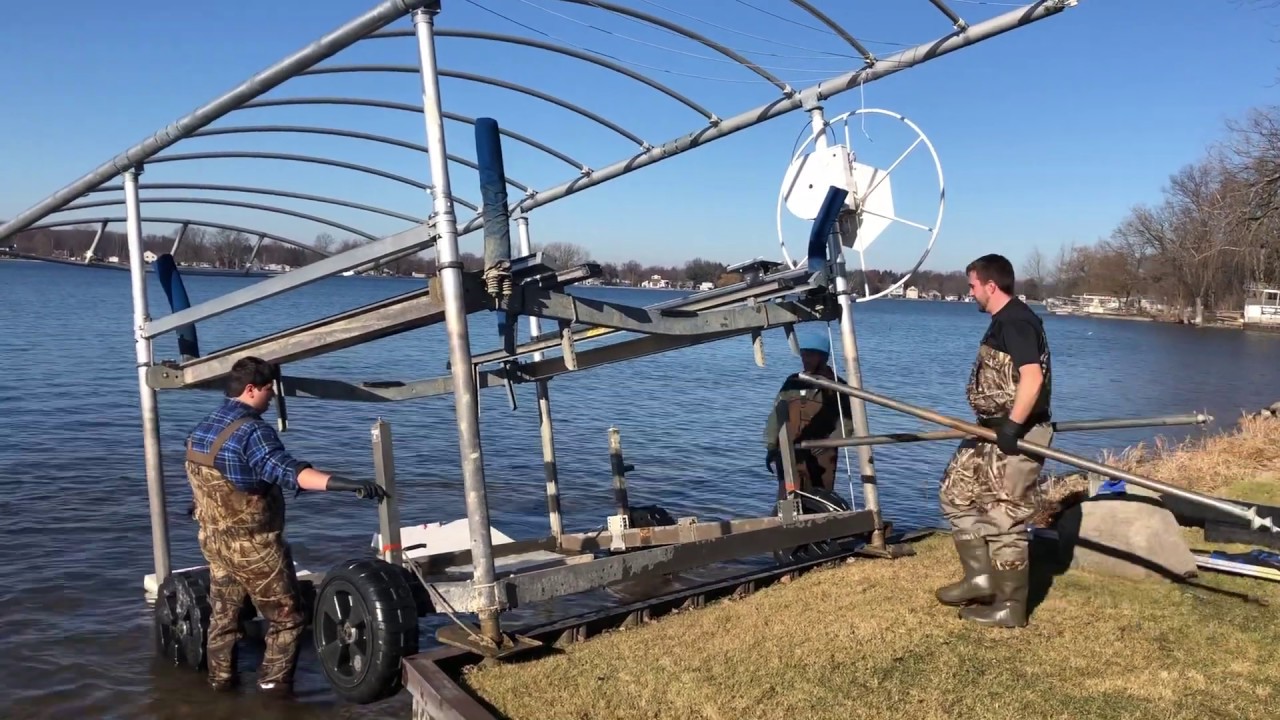 Boat Lift Removal Over Sea Wall
