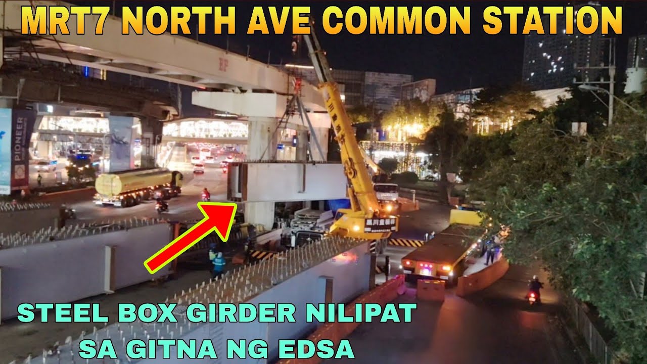 Стальная коробчатая балка перемещена в середину станции EDSA/MRT7 North Avenue Common Station, об...