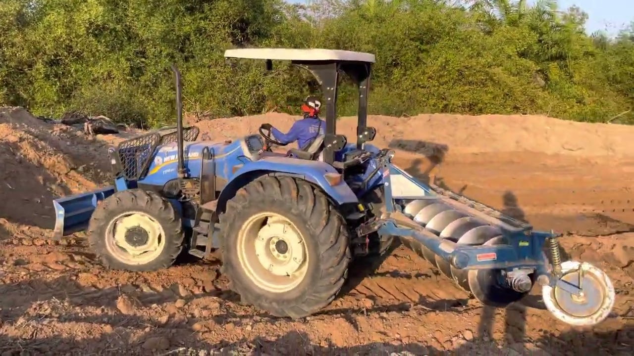 ทำดันดินป้องกันน้ำ newholland tt4.65