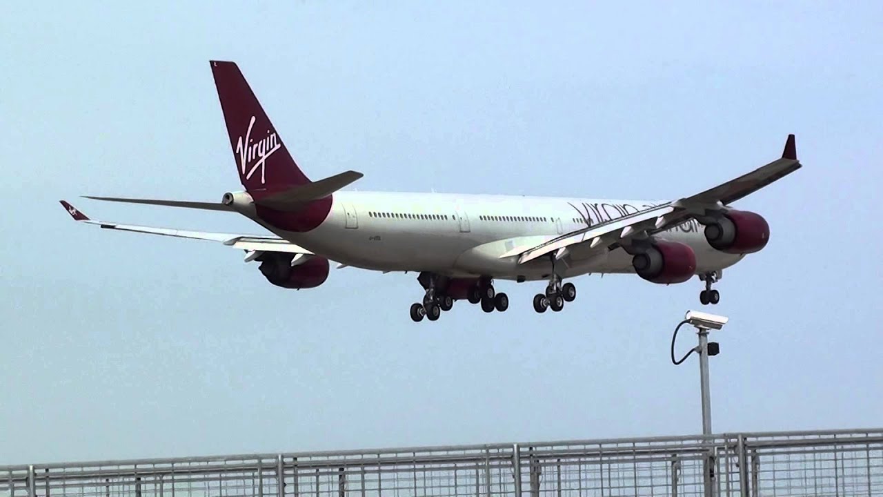 Virgin Atlantic Airbus 340-600 G-VEIL Landing London Heathrow 09L