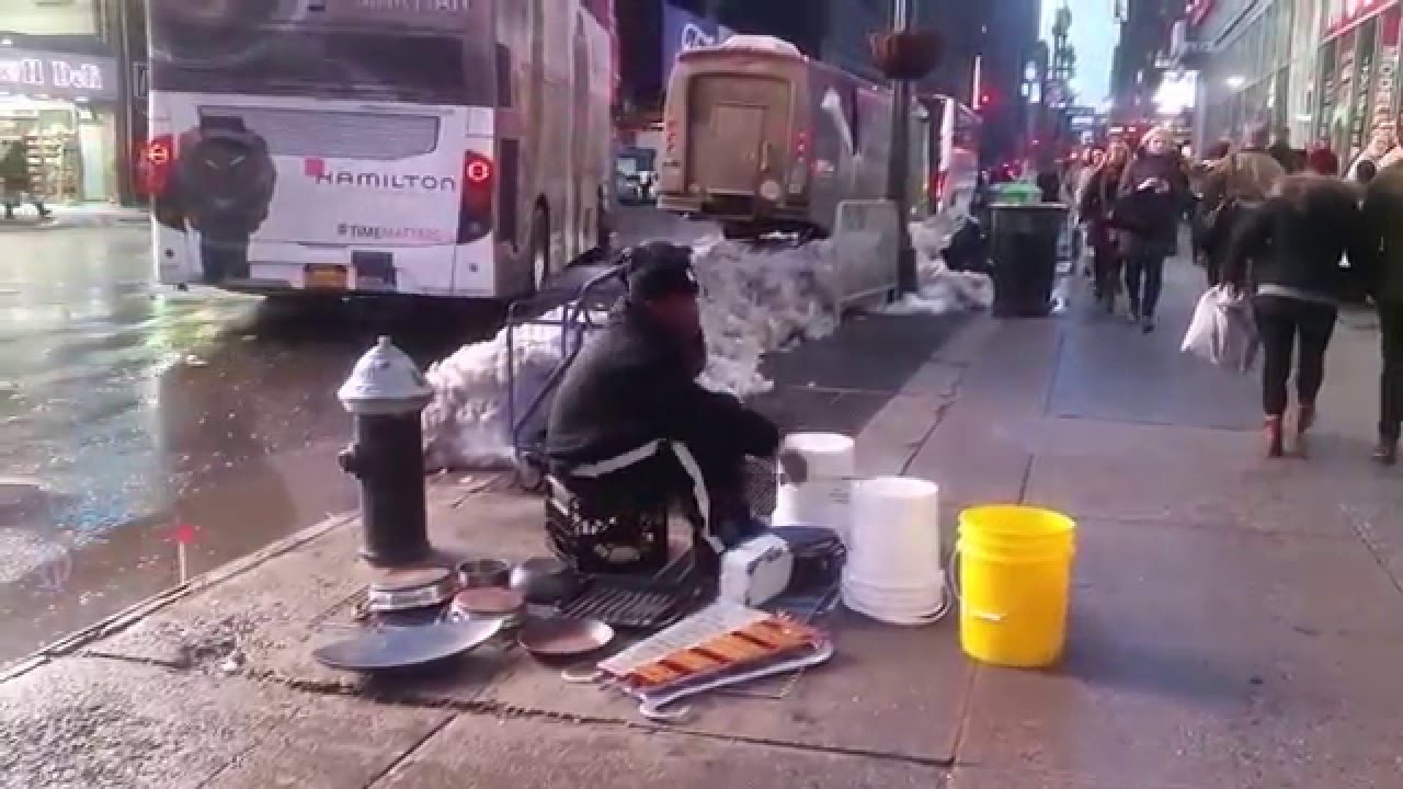Playing drum on buckets