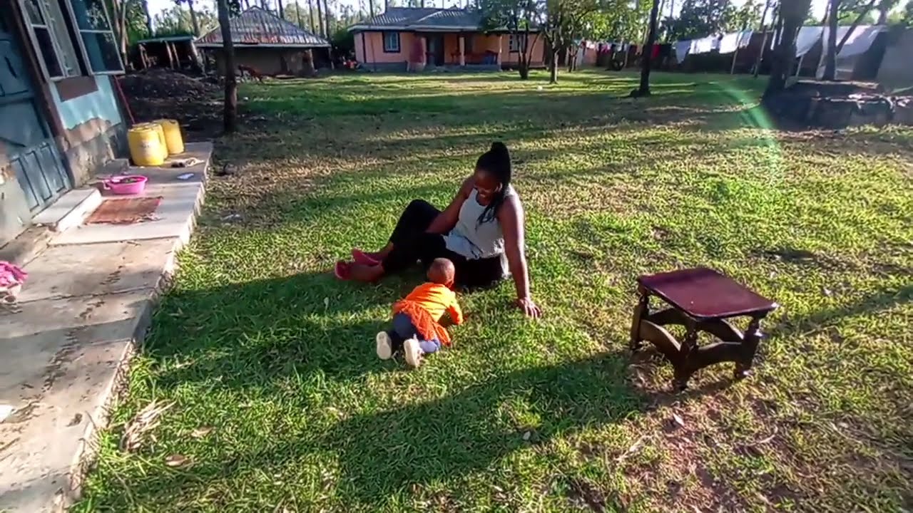 AFRICAN VILLAGE MOM BREASTFEEDING BABY AT HOME//WE PLAY,SING,FEED AND BURP