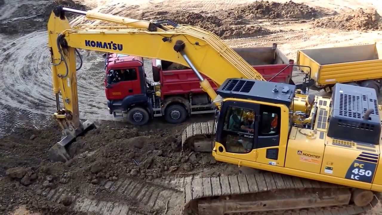 Komatsu PC 450LC and Man tipper