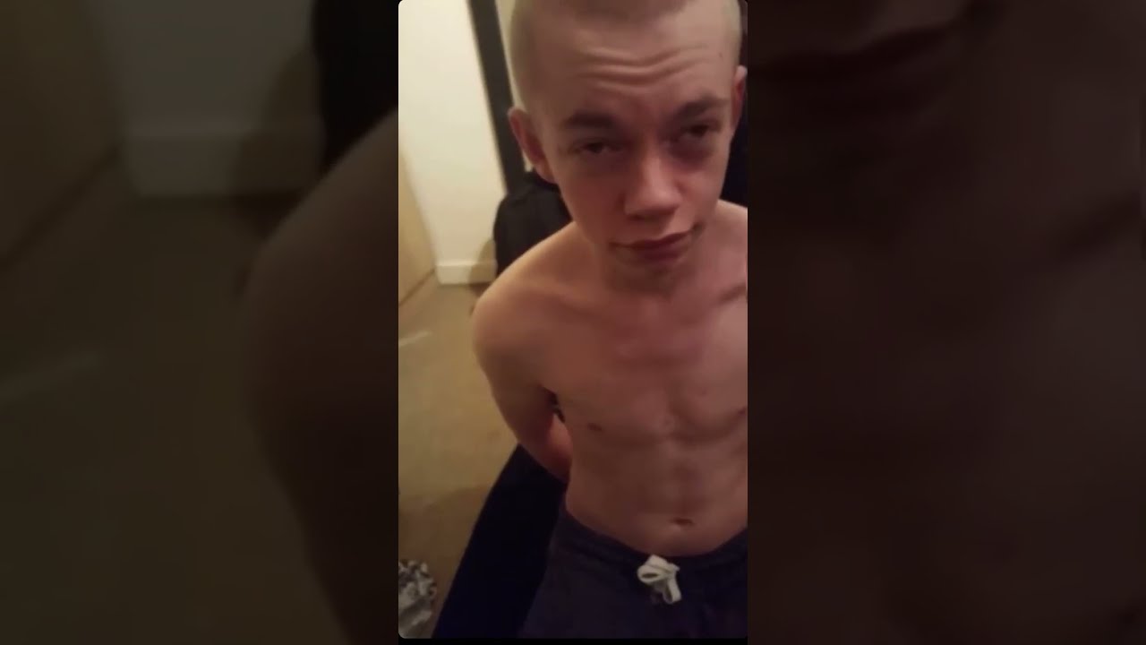 A young slave receive a headshave by his master