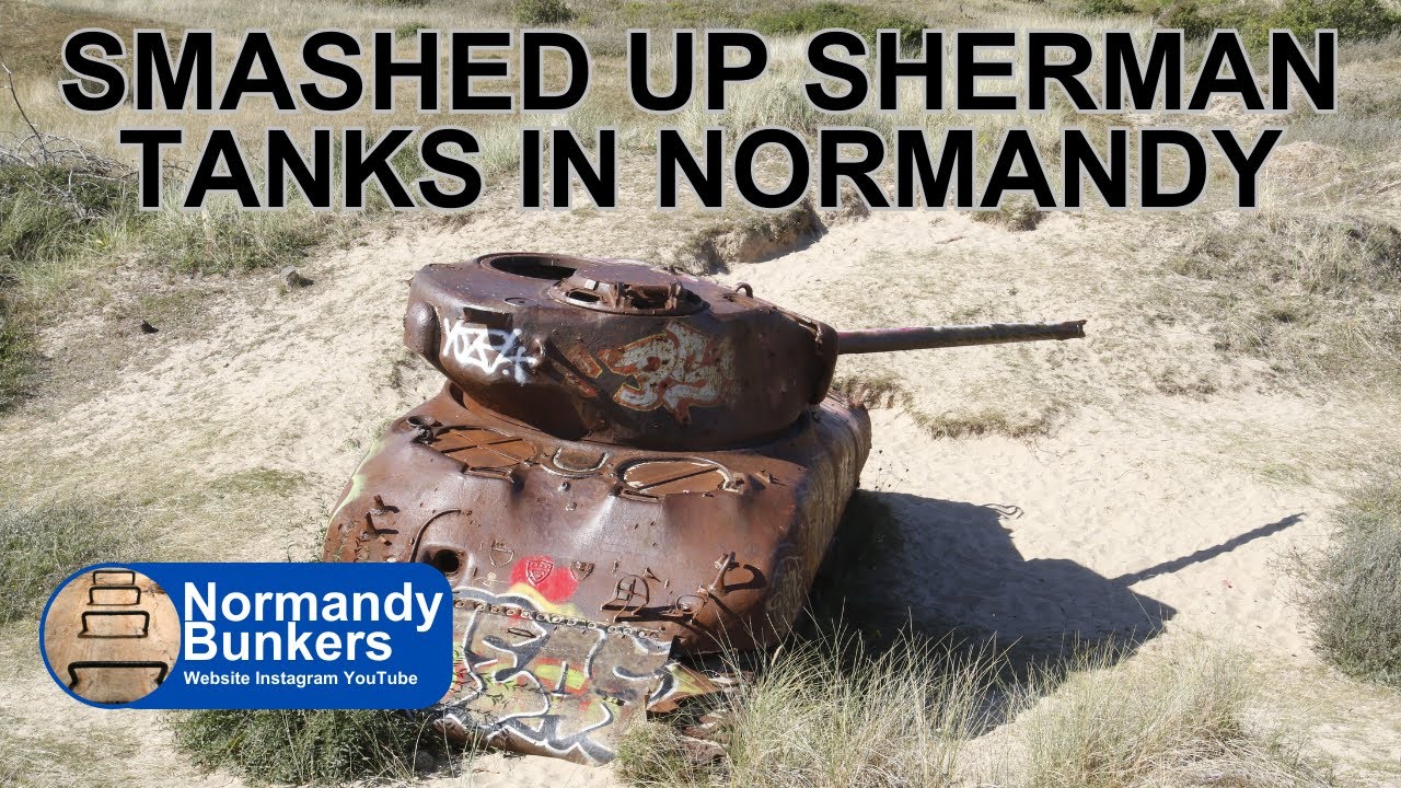 Smashed up Sherman tanks & vehicles in Normandy dunes
