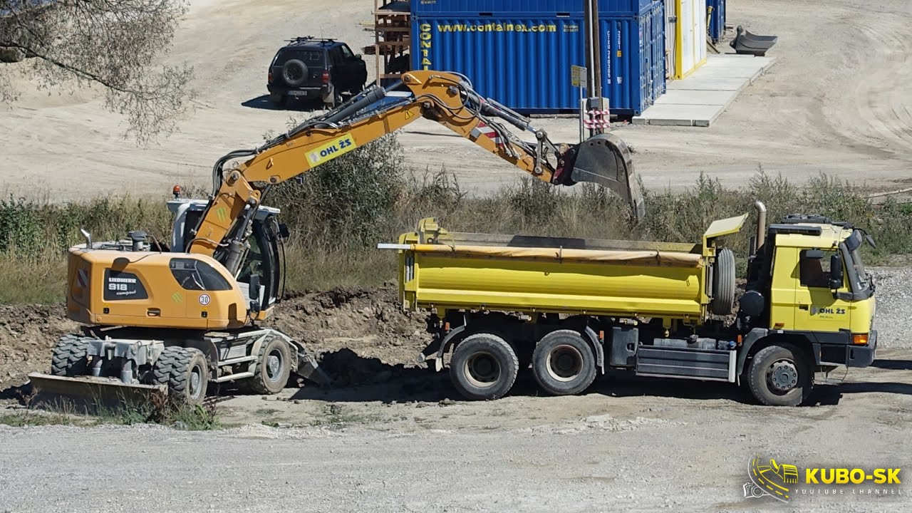 Liebherrr A918 compact moving clay and loading Tatra Terrno1