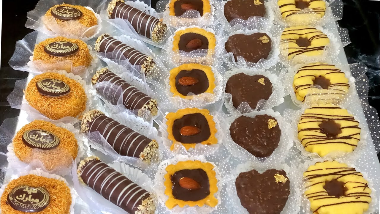 تشكيلة حلويات بعجينةوحدة👌ب250غ مارغرين كل نوع بذوق مميز ويذوب فى لفم 😋 راح تفاجئي ضيوفك في هذا العيد