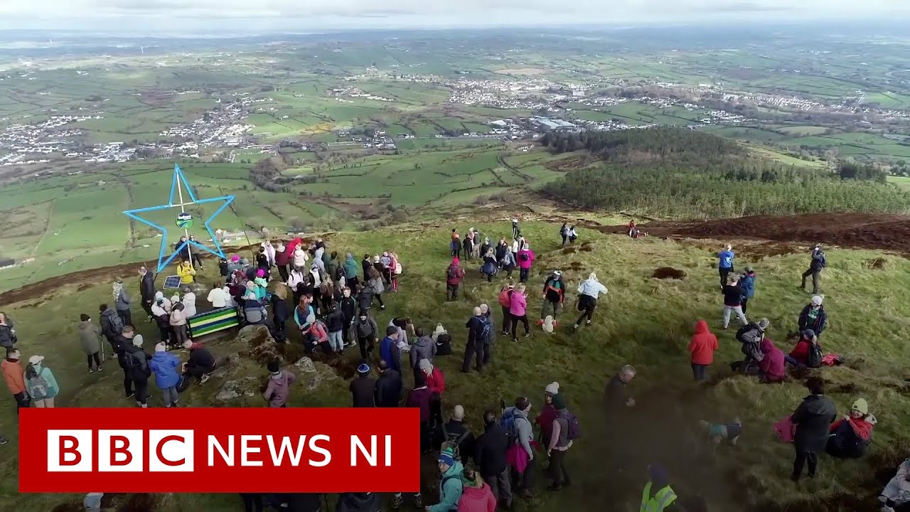 Motor neurone disease patient's spirits lifted by community mountain climb