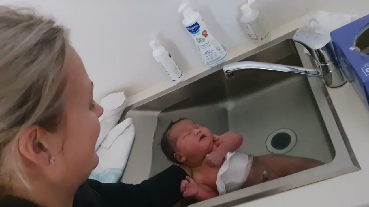 Naomi's first bath