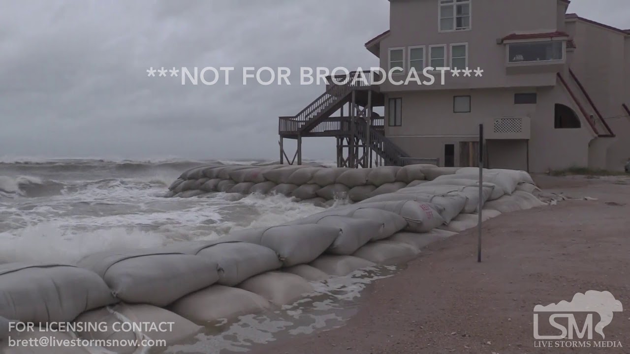 09-13-18 North Topsail Beach, NC - Hurricane Florence waves crashing on houses and sandbags