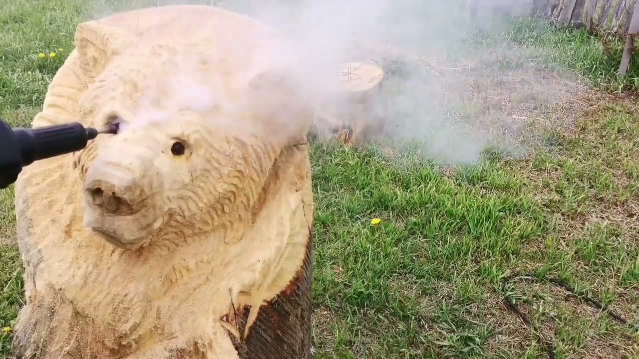 Chainsaw carving Bears for a wooden bench