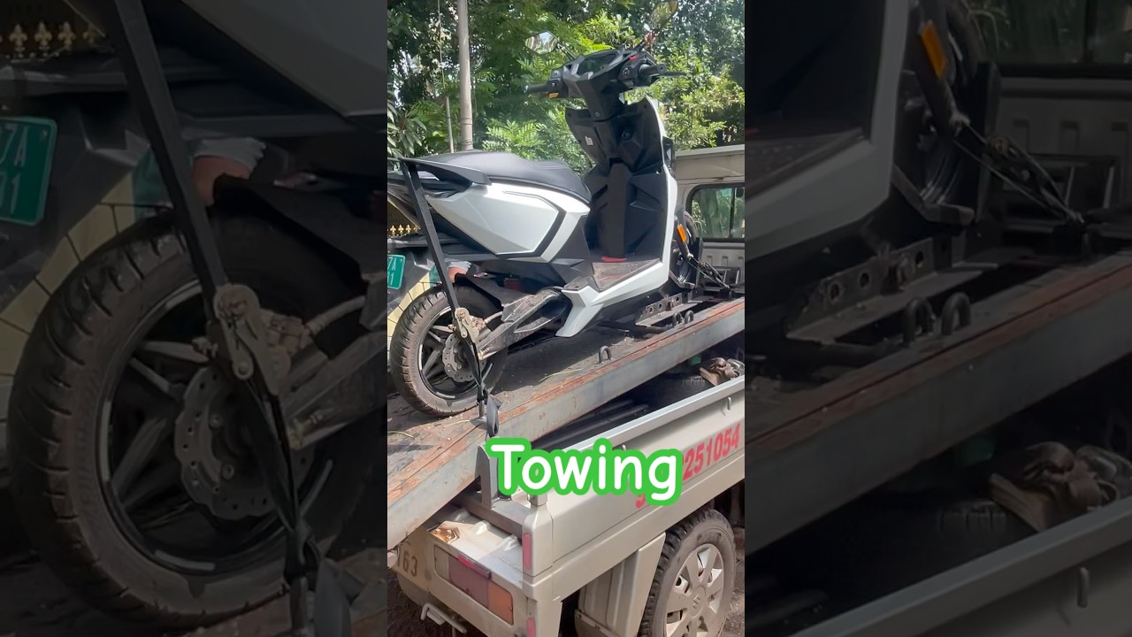Towing Simple One Electric Scooter for Repairs 
