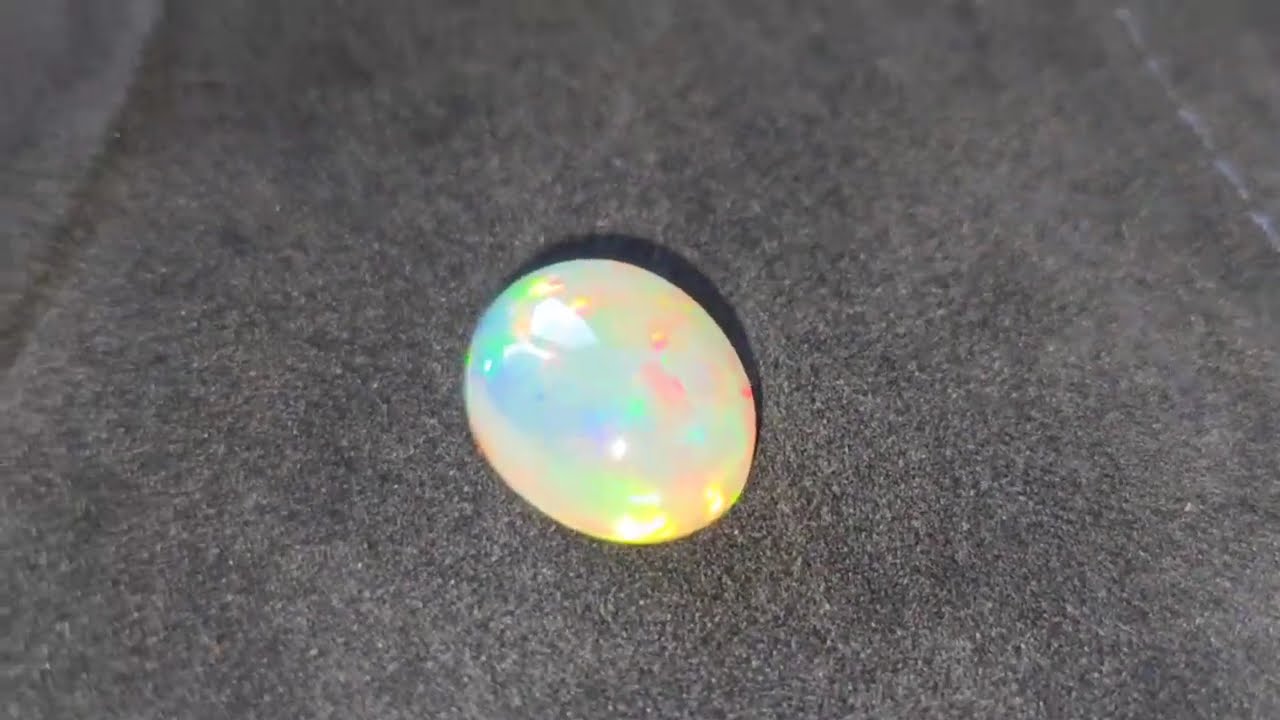 Ефіопський опал кабашон 10.6 Cts 16 х 13 мм