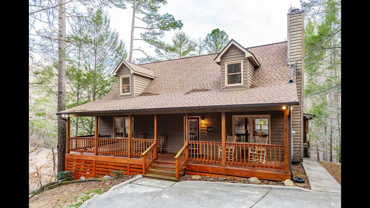 Smoky Cabins presents Nestled Inn, a cabin in the Smoky Mountains.