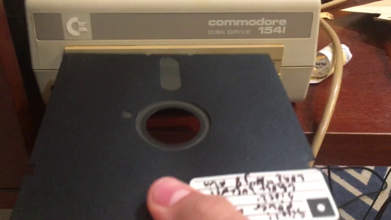 ASMR putting a floppy disk in the 1541C disk drive