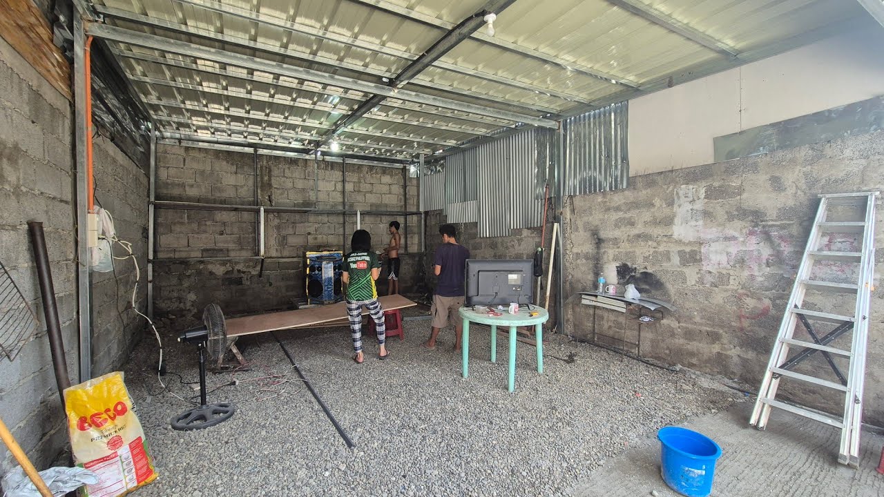 В гараже, на улице Солиман, город Давао, Филиппины.