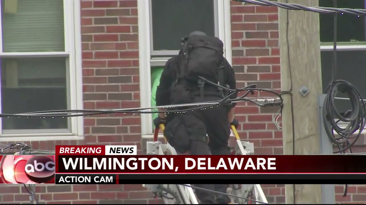 Woman exits apartment building hours after Wilmington officers shot