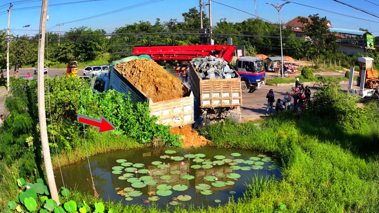 Huge Dump Truck Unloading Tons of Dirt  Road Construction Process!