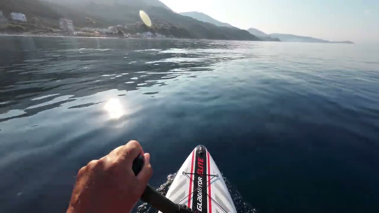SUP walk along the coast of Borsh Albania on high waves