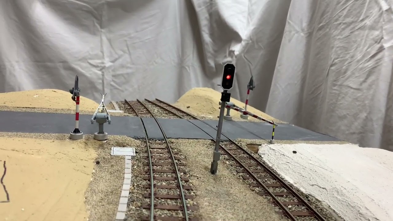QDecoder gesteuerter Ablauf für eine Schranke, Blinklicht, Sound und ein Signal