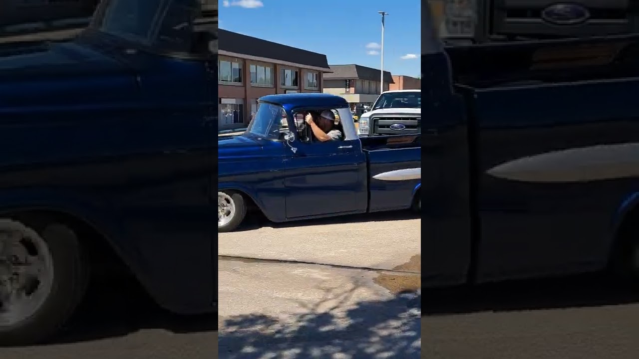 Beautiful 58 Chevy Apache fleetside leaving the car show.