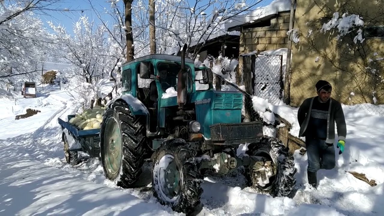 Tractor T40 gets stuck on a hill with a trailer