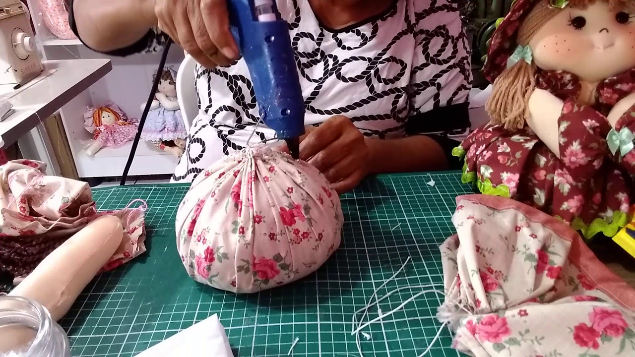 BONECA  PESO DÊ PORTA,MENINA flor,Com AURENI.